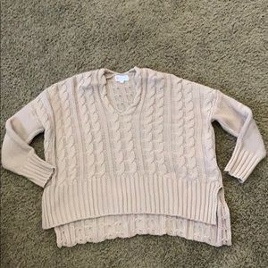 Loose fitting slightly cropped sweater